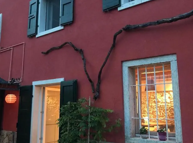 Ferienhaus Redhouse Pesina *