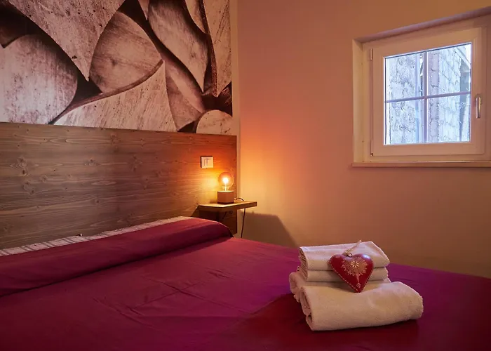 Redhouse Pesina Ferienhaus