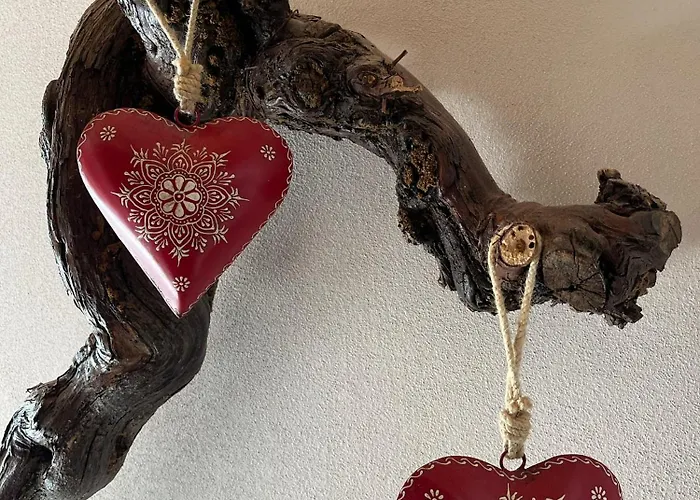 Redhouse Pesina Ferienhaus